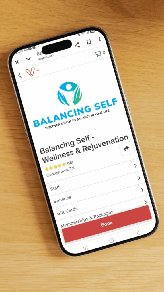 Mobile view of the Balancing Self Vagaro booking page showing wellness services in Georgetown, TX, including PEMF, light therapy, and life coaching.